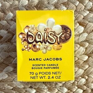Marc Jacobs Daisy Scented Candle in Bright Yellow Packaging